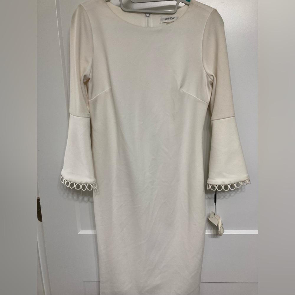 Calvin Klein Dress in Ivory with 3/4 length sleeves. Perfect dress! Size 4P